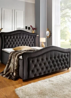 Boxspringbett mit gepolsterten Kopf- und Fußteil