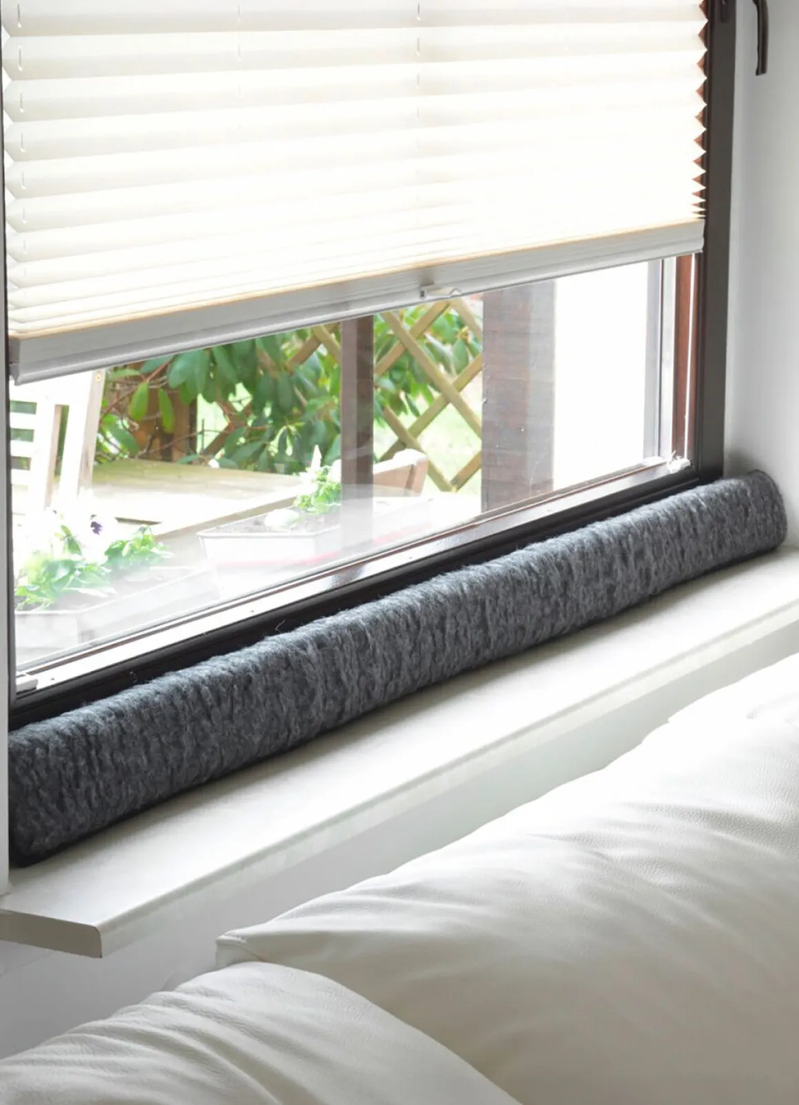 Schurwoll-Zugluftstopper für Fenster