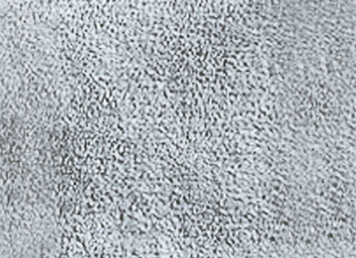 Wohndecke und Sesselschoner mit Fransenabschluss